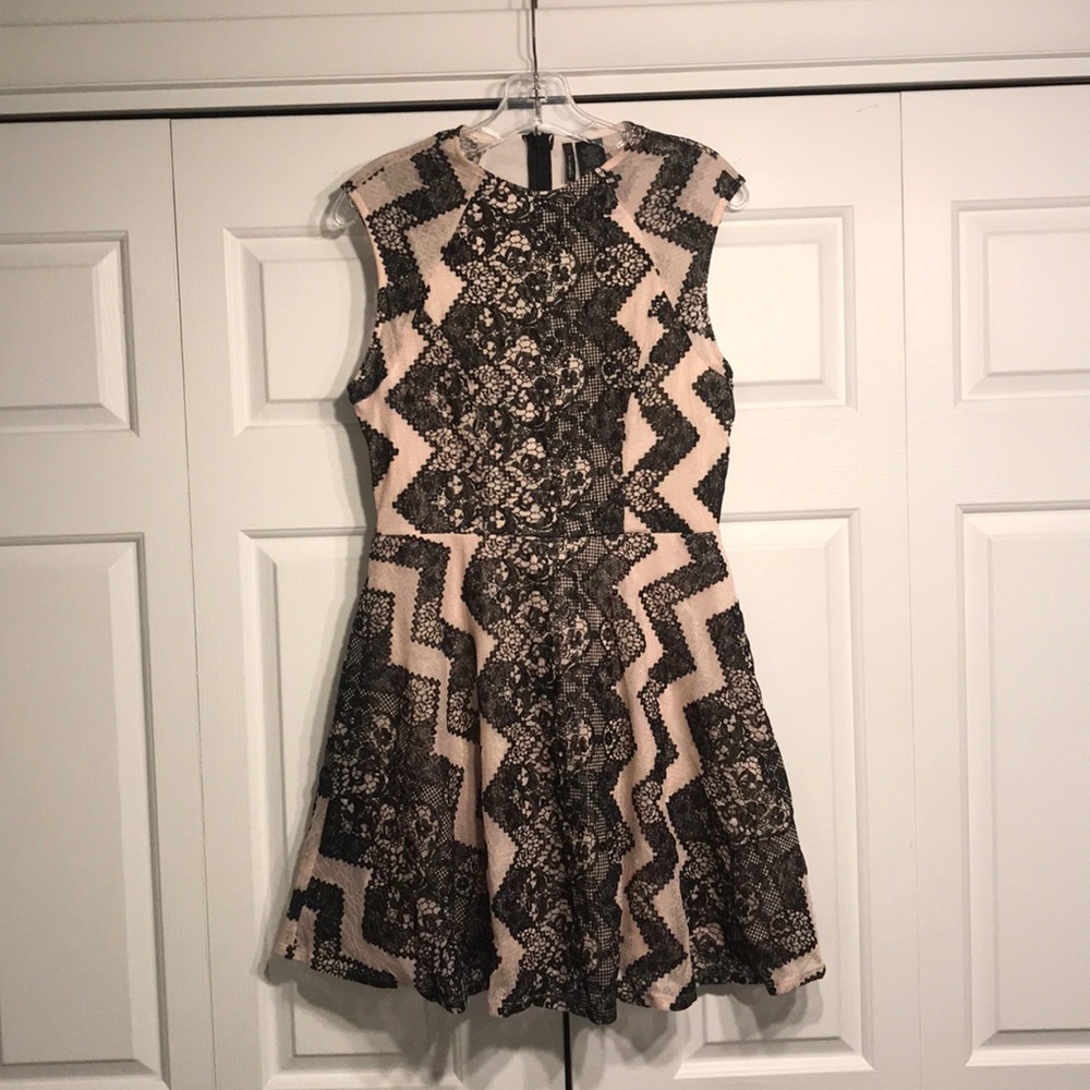 Nude and black lace cocktail dress